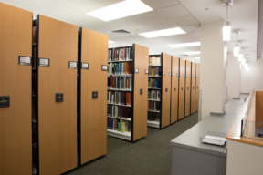 Spacesaver High-Density Mobile Shelving in Library - Library Storage
