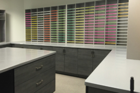 Mail Room Casework featuring a color coded sorter - Modular casework