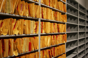 Bin dividers help organize evidence storage on 4 post static shelving