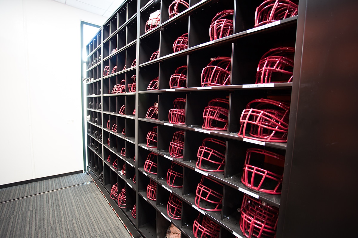 Face Mask Storage in Cubbies for Football Storage on 4-Post Shelving